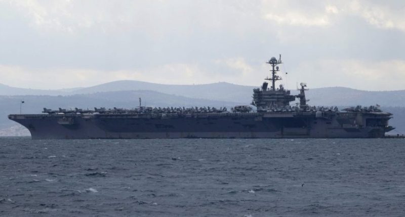 Aircraft carrier USS Harry S. Truman is moored near Split, Croatia, Feb. 14, 2022. (AP Photo/Darko Bandic, File)