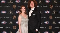 Footy great Ben Brown launches into tear-jerking defence of his wife after she was bullied over her looks on TV