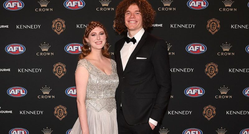 Footy great Ben Brown launches into tear-jerking defence of his wife after she was bullied over her looks on TV