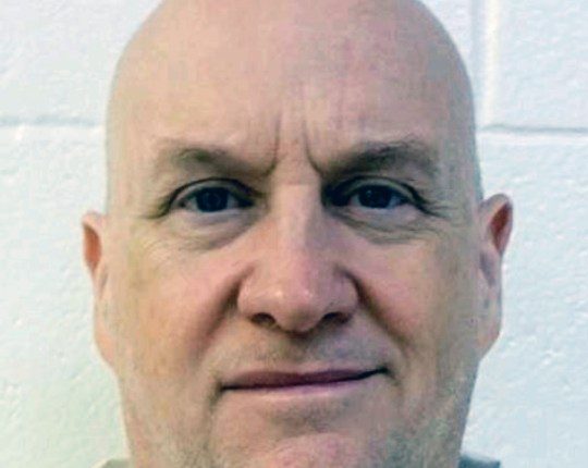 Former police chief, serving murder and rape sentences, escapes from Arkansas prison