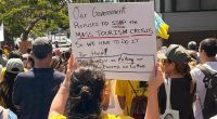 Holidaymakers too scared to leave their rooms as thousands of anti-tourism protesters take to the streets of the Canary Islands