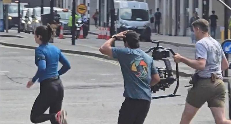 Hollywood actress sprints across a road in east London
