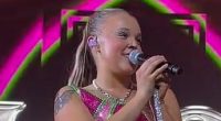 JoJo Siwa fans go wild as singer gives another MAJOR clue her and Chris Hughes are officially together with sweet on stage tribute after he meets the family