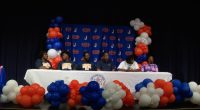 Johnson sends 2 football players to next level