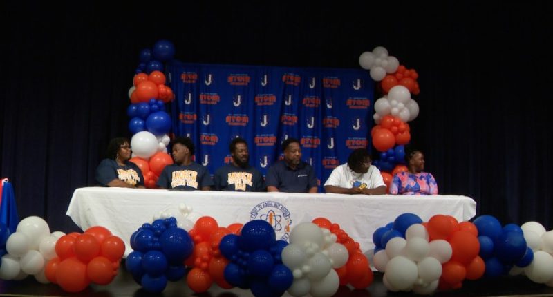 Johnson sends 2 football players to next level