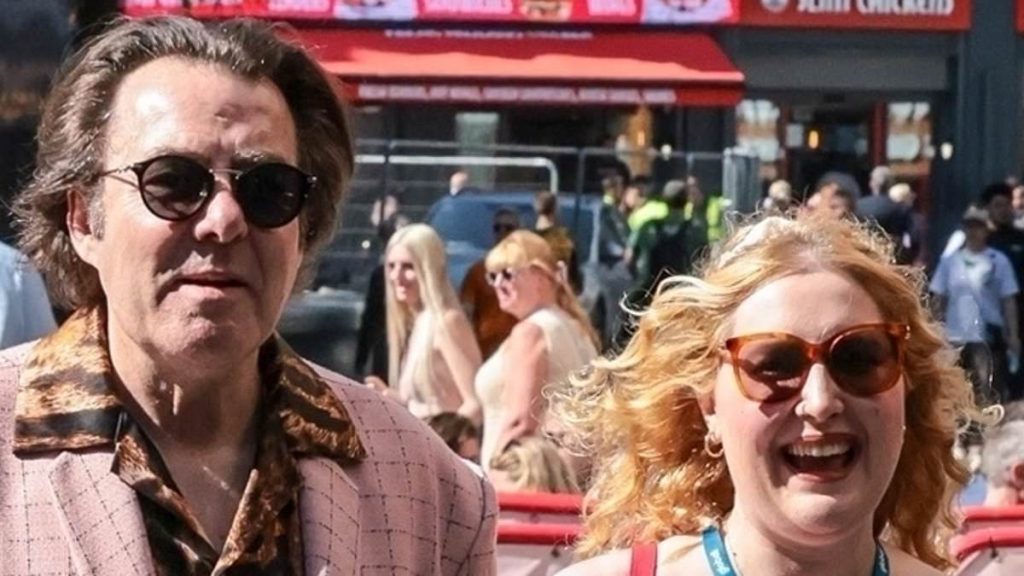 Jonathan Ross, 64, and daughter Honey Kinny, 28, take a London stroll
