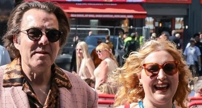 Jonathan Ross, 64, and daughter Honey Kinny, 28, take a London stroll