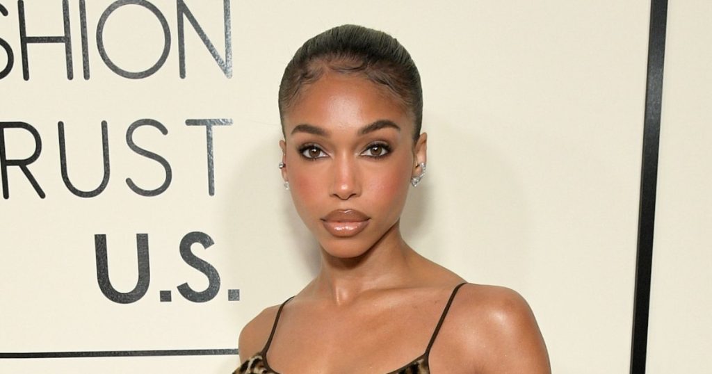Lori Harvey Shows Off Her Rock Hard Abs in Sleek Alo Gear