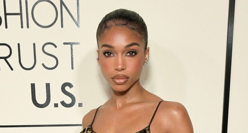 Lori Harvey Shows Off Her Rock Hard Abs in Sleek Alo Gear