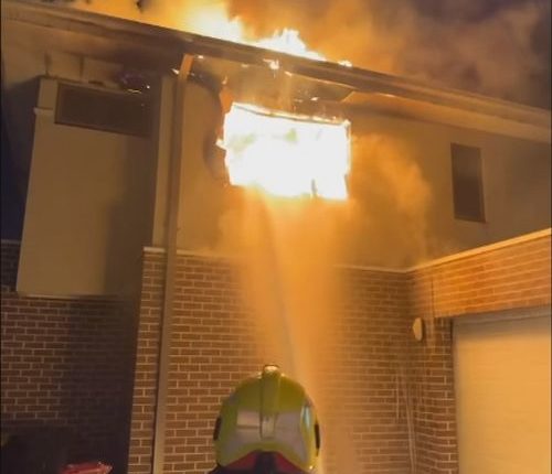 Man ruled out as suspect in house blaze as children, mother fight for life