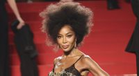 Naomi Campbell, 54, exudes glamour in a black and gold gown in Cannes