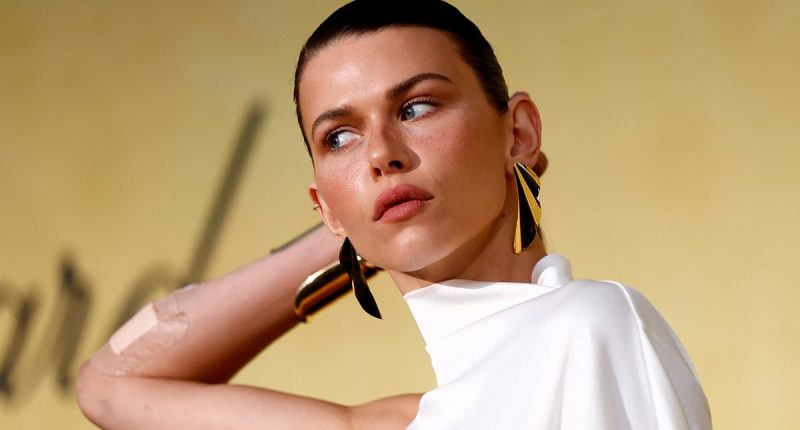Ouch! Victoria's Secret model Georgia Fowler bleeds through a bandage on her arm at Cannes Film Festival