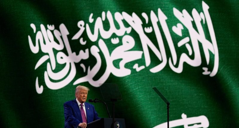 President Donald Trump speaks from a podium