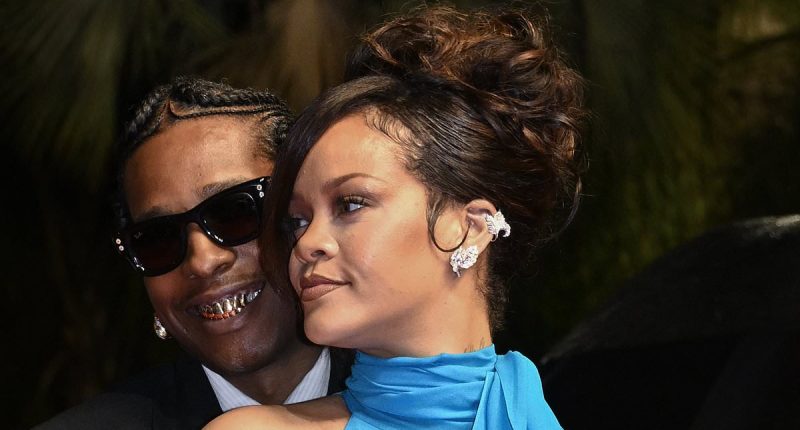 Pregnant Rihanna shows off her baby bump in a ruffled blue dress