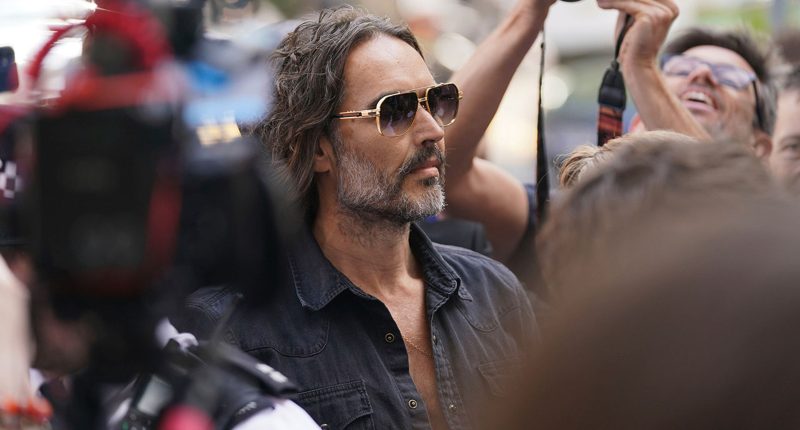 Russell Brand granted conditional bail after appearing in London court on rape and assault charges