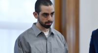 Salman Rushdie's knife attacker is jailed for 25 years for shocking assault that left the Satanic Verses author blind in one eye