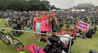 Daniel Russell, Erin Boeckman, family and support volunteers before the CapTex Tri.