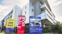 For sale signs outside a Melbourne apartment.