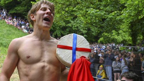 YouTuber crowned back-to-back winner of world's most dangerous cheese race