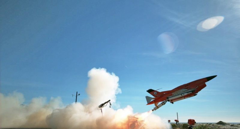 A BQM-34 unmanned aerial vehicle launching a Solid Fuel Integral Rocket Ramjet (SFIRR) missile.