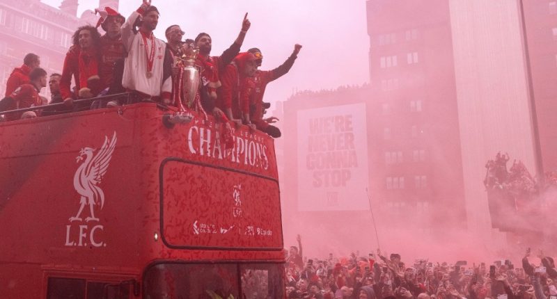 Liverpool Premier League champions on a parade bus.