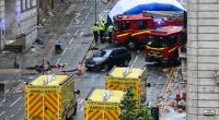 Emergency responders at the scene of a car accident.