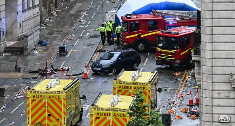 Emergency responders at the scene of a car accident.