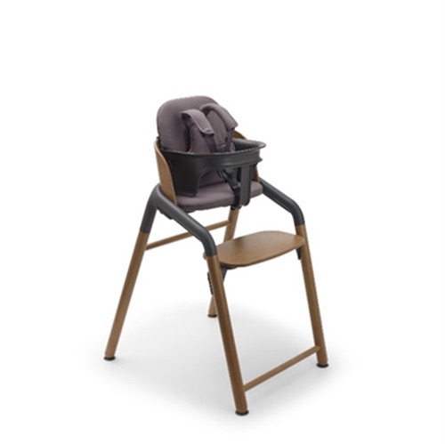 Recalled high chair with wooden legs.
