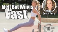 Healthy and fit atrractive blonde woman strengthens her arms by performing bar dip exercises at the skate park while looking straight ahead. 5 Counter-Height Moves to Melt Bat Wings Over 50 (No Gym Required). Cover