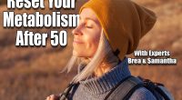 Middle age woman stretching arms breathing fresh air in a forest in autumn. Female traveler spends their vacations going hiking