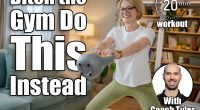 One mature caucasian blonde woman training with kettlebell girya russian bell at home female exercise in her apartment healthy lifestyle concept. 6 Kettlebell Moves That Replace Your Entire Gym Routine After 40, cover