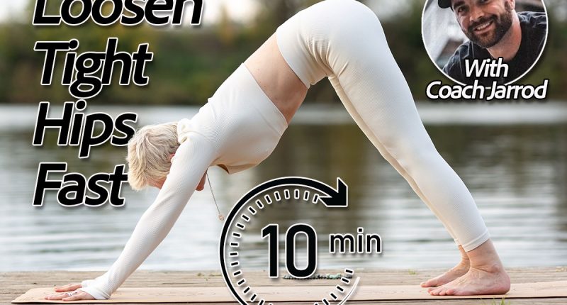 A mature woman practicing yoga, performing exercises on four limbs, push-ups from the floor, dog pose with its muzzle down, Adho Mukha Svanasana, training, dressed in sports clothes.