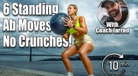 Woman in fitness wear doing workout with a heavy medicine ball outdoors.. Sporty girl with fit body in sportswear posing on sky background.