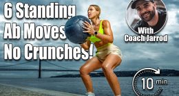Woman in fitness wear doing workout with a heavy medicine ball outdoors.. Sporty girl with fit body in sportswear posing on sky background.