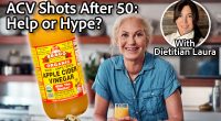 I always start my day with a glass of orange juice. Cropped portrait of an attractive senior woman enjoying a glass of orange juice while preparing breakfast in the kitchen. Apple Cider Vinegar Shots Are Back—Do They Really Help After 50? Cover