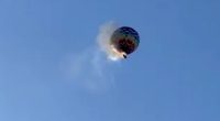 At least 8 de@d as hot air balloon carrying 22 people bursts into flames and crashes (videos)