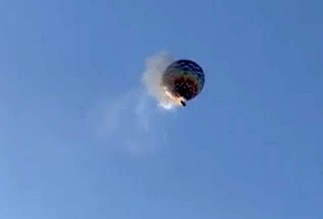 At least 8 de@d as hot air balloon carrying 22 people bursts into flames and crashes (videos)