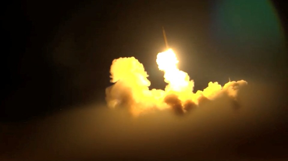 Missile launch at night.