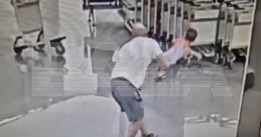 Boy, two, 'in a coma' after passenger throws him to the floor