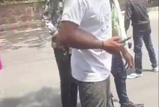 Video still of Vishwash Kumar Ramesh walking away from a crash.