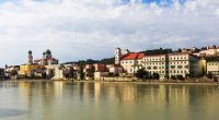 Passau's historic skyline reflected in the Inn River.