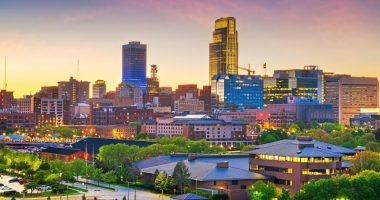 Omaha, Nebraska downtown skyline at dusk.
