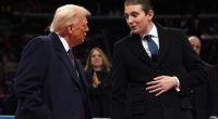 Donald Trump speaking with his son, Barron Trump.