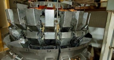 Industrial cereal plant multi-head weigher.