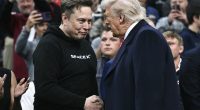 Elon Musk and Donald Trump shaking hands.