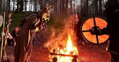 Police raid a Russian forest ceremony.