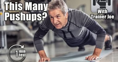 Senior male stays fit by doing pushups on a mat inside the fitness center. If You Can Do This Many Pushups, You’re Stronger Than Most People Over 50. Cover