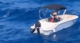 Small motorboat on the ocean.
