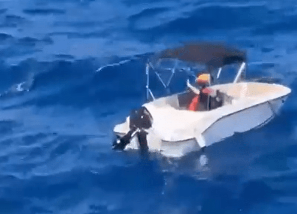 Small motorboat on the ocean.