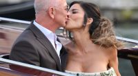 Jeff Bezos and Lauren Sanchez kissing on a boat.